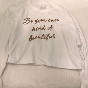 White long sleeved crop top with writing